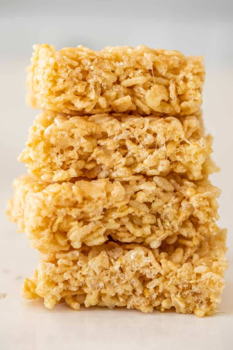 Rice krispie treat slices stacked on top of each other. 