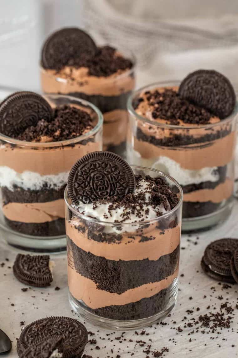 Four cups of chocolate Oreo pudding delight. 