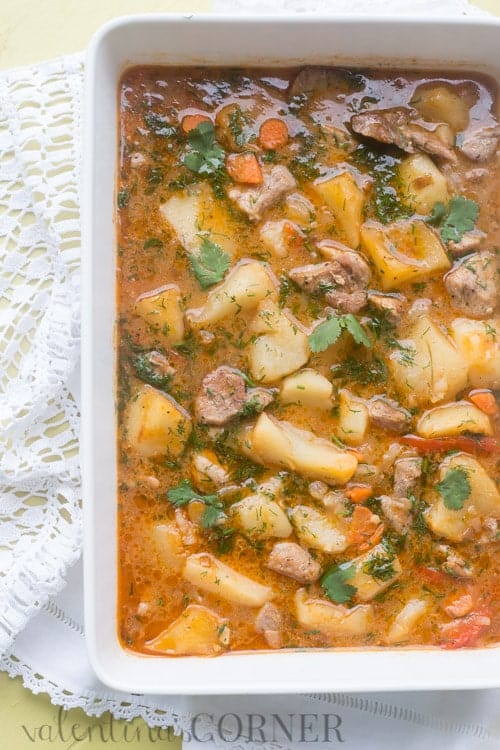 Potatoes in a casserole braised with meat, carrots, peppers and a creamy mixture. 