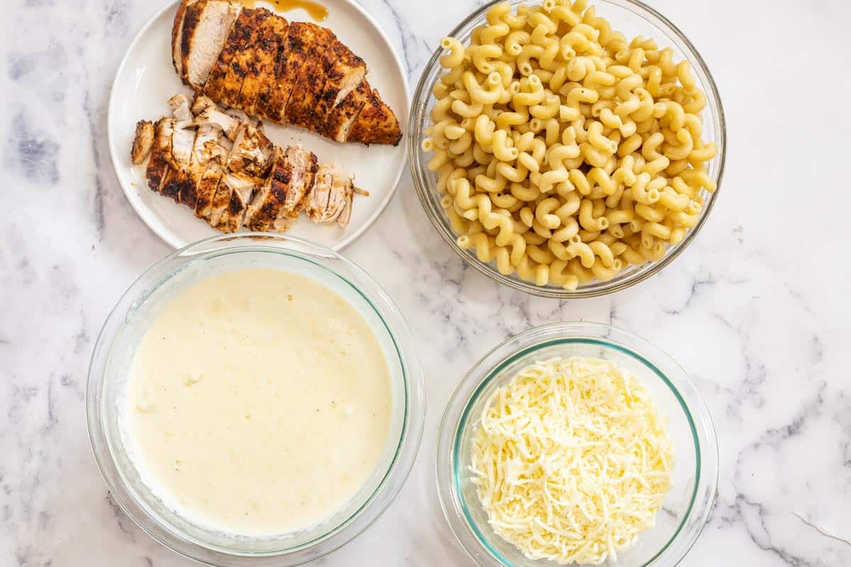 All the ingredients needed for homemade chicken Alfredo bake. 