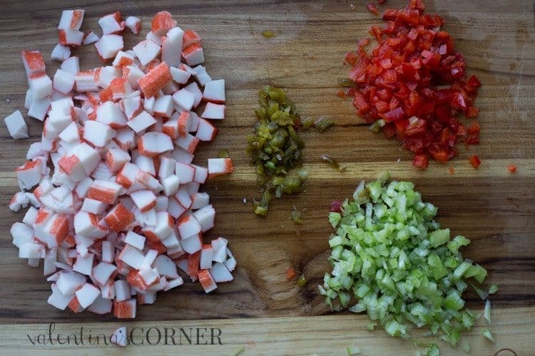 How to cut the ingredients for crab dip. crab, jalapeno, pepper, and celery chopped. 