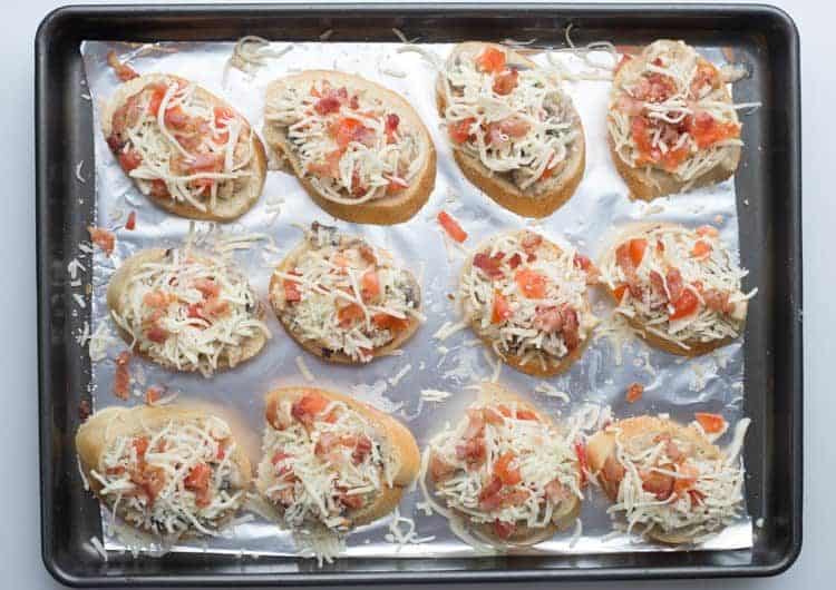 How to assemble Alfredo canapes recipe with Alfredo mixture, cheese and tomatoes.