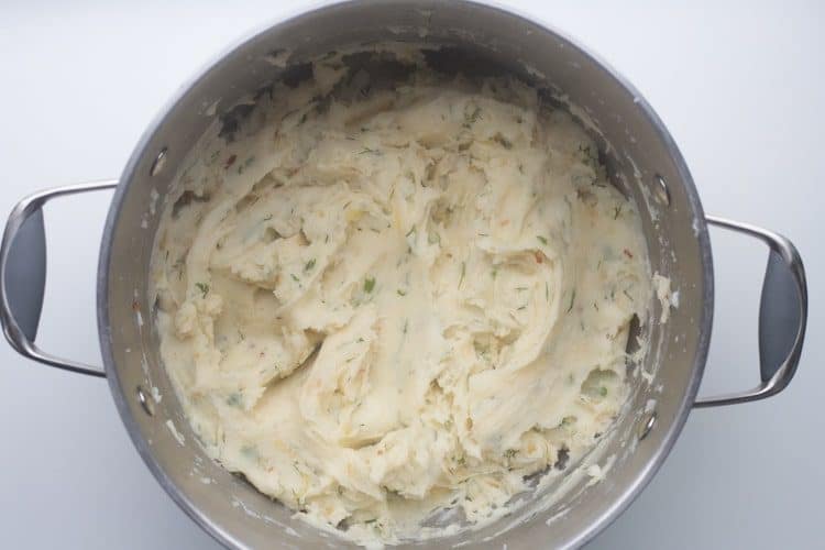 How to make cheesy potato filling recipe with cheese, onions and herbs.