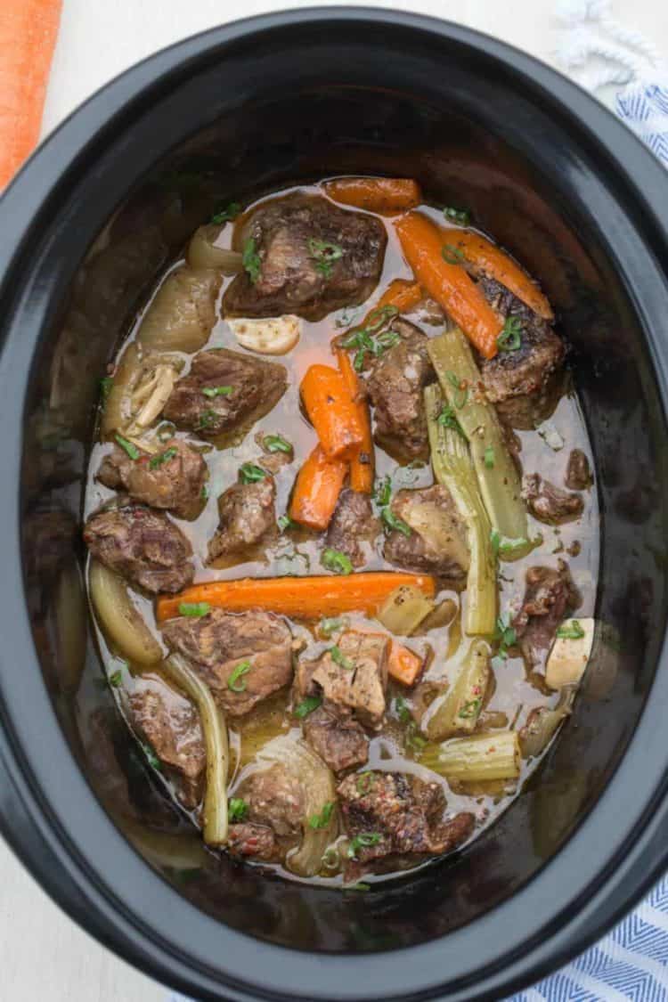 The best slow cooker roast beef recipe made with onions, celery and carrots. 