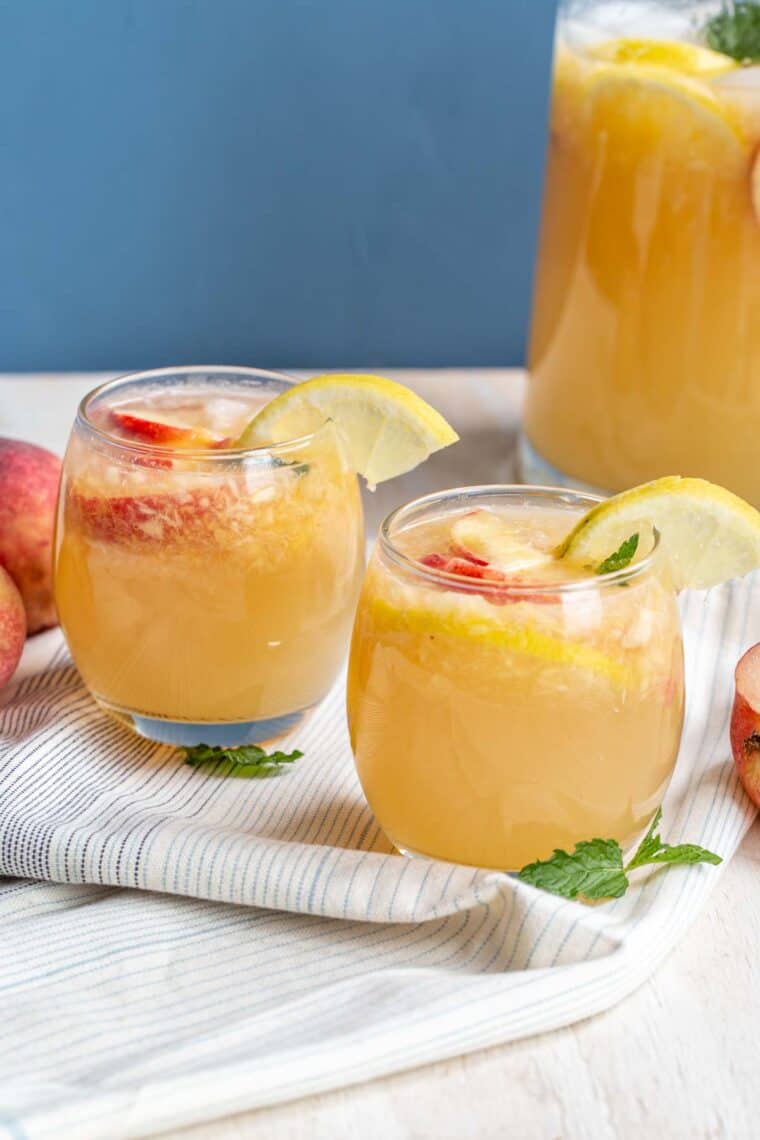Peach sparkling lemonade recipe with fresh peaches and lemon.