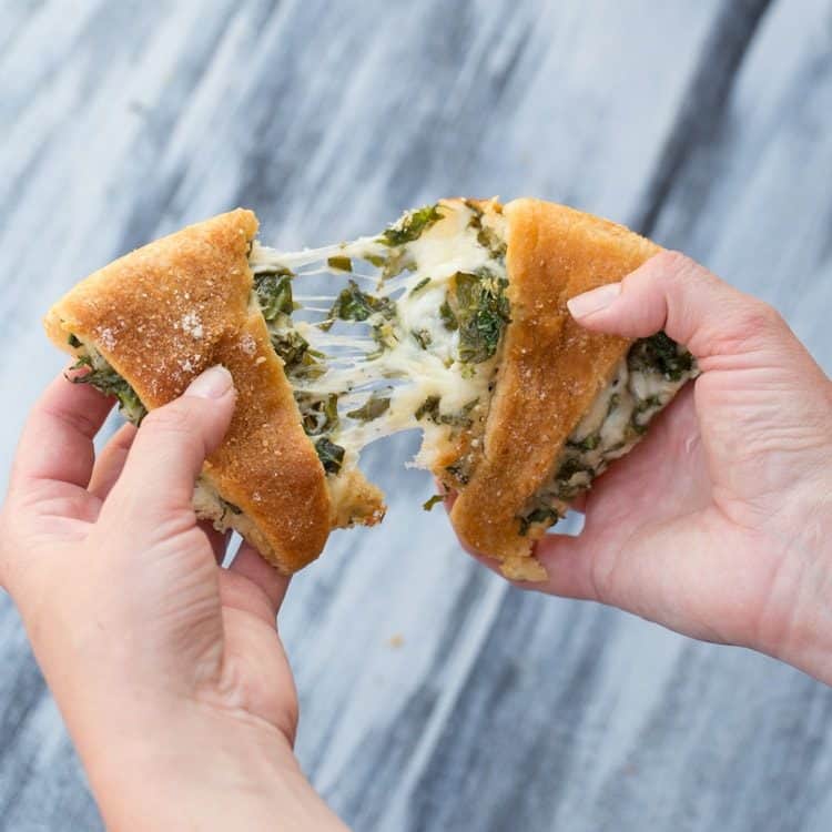 Spinach and Cheese Crescent slice cut in half.