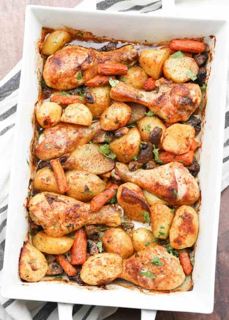 One Pan baked chicken legs and potatoes with vegetables recipe.