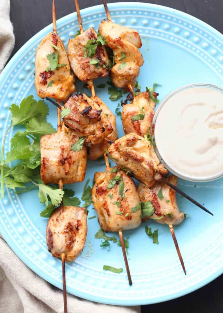 Grilled chicken thighs on a stick.