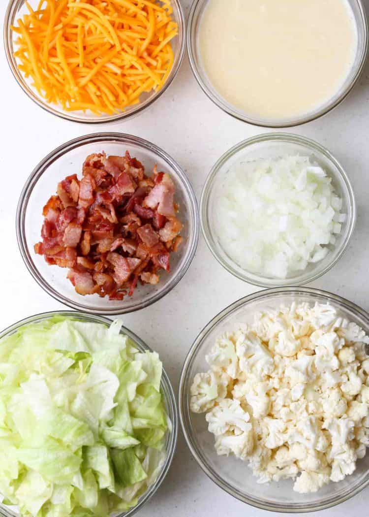 How to cut vegetables for cauliflower and bacon salad. Cut vegetables in serving bowls. 