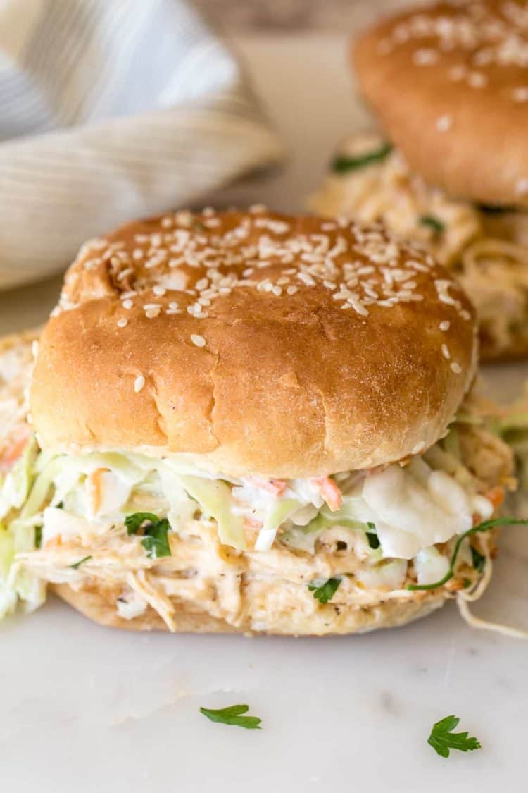 Crack Chicken recipe made as a sandwich with coleslaw.
