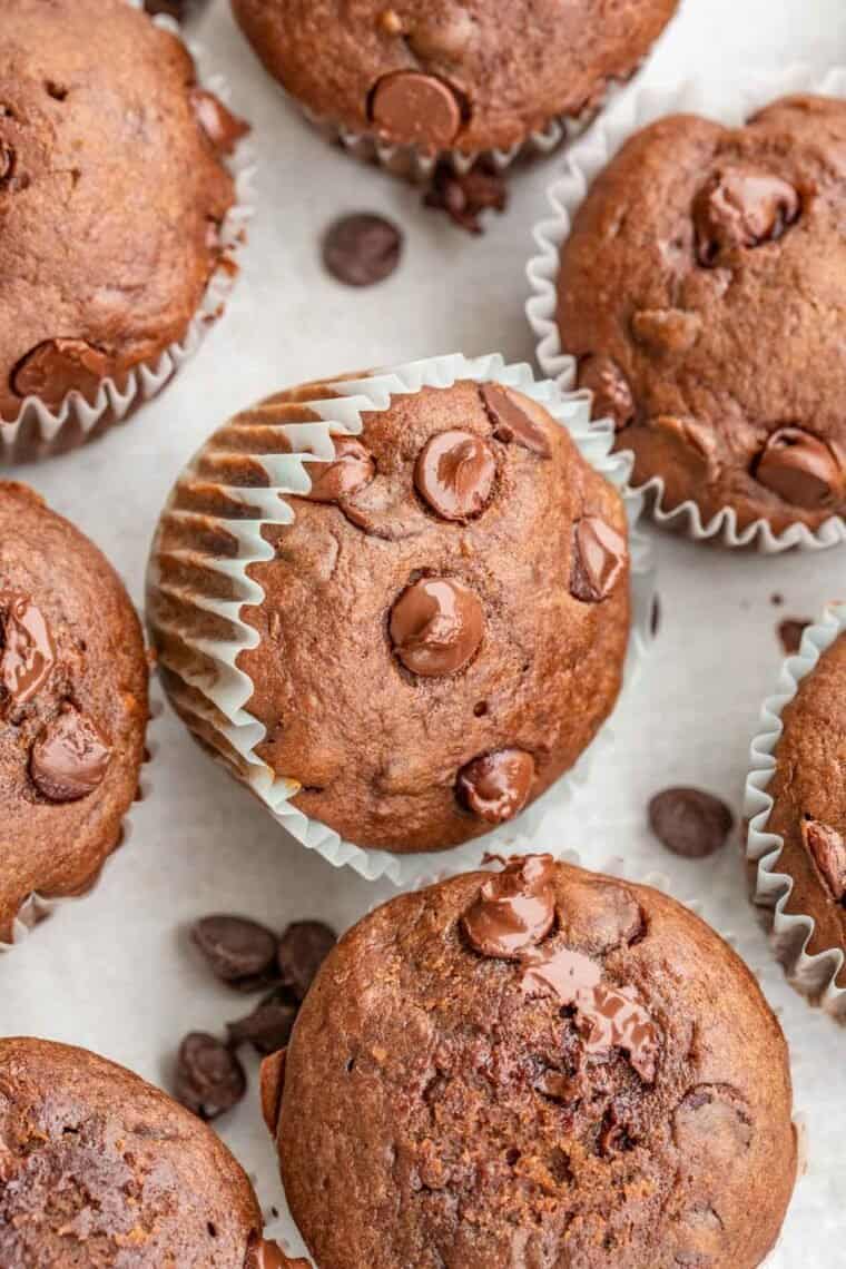 Chocolate banana muffins laid out. 