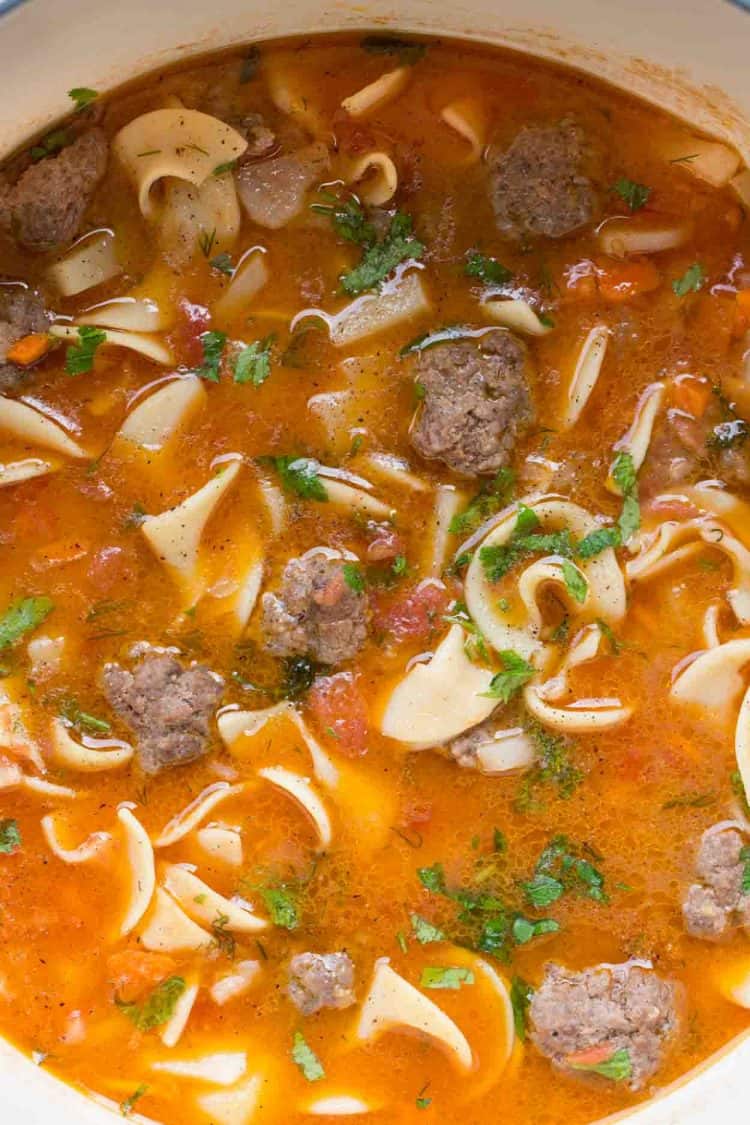 A classic soup recipe with meatballs, noodles, potatoes, and sautéed vegetables.