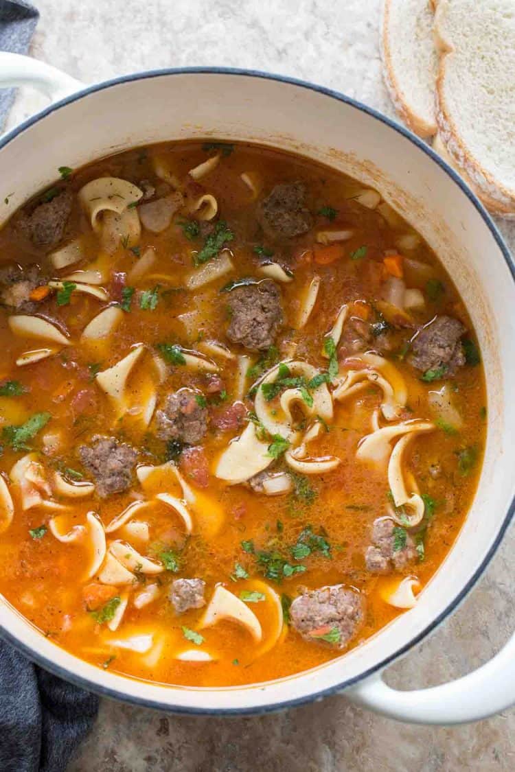 Meatball noodle soup with carrots, onions and homemade meatballs.
