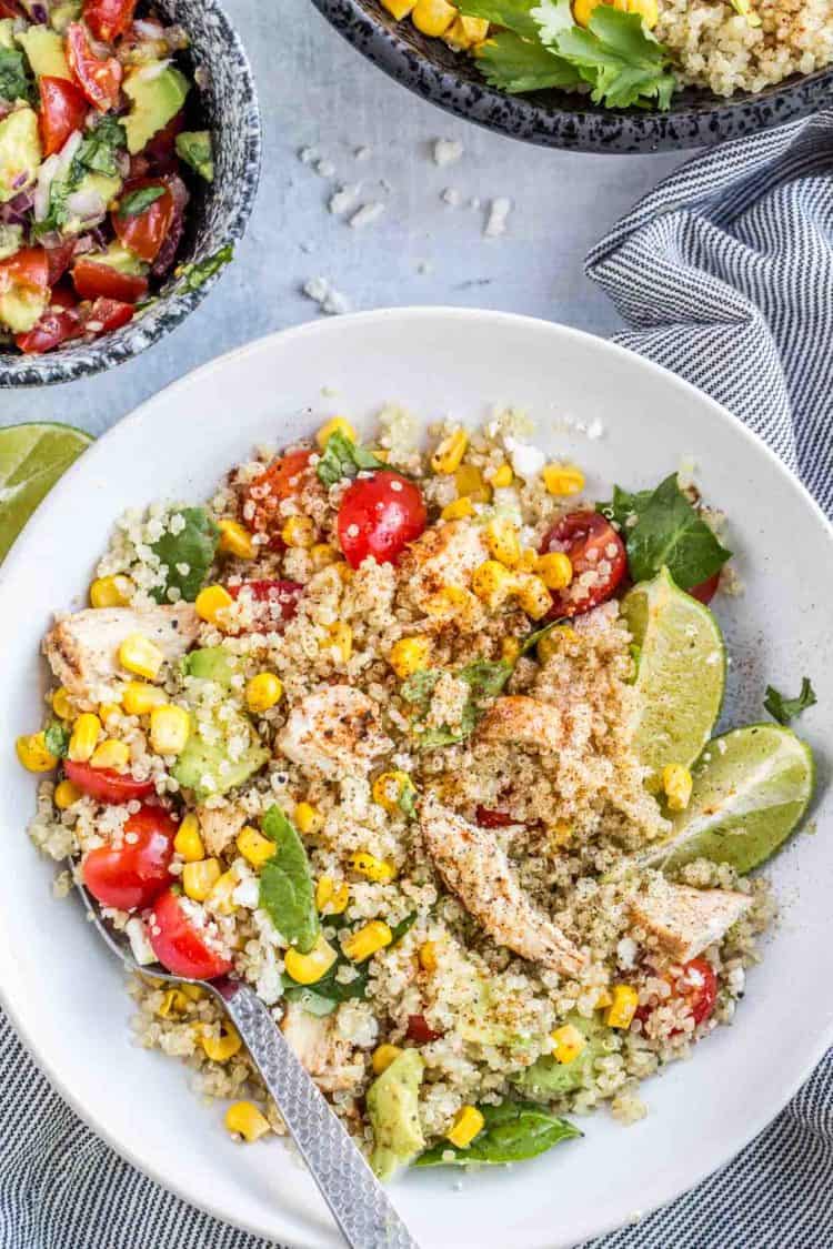 Chicken quinoa bowl tossed before serving.