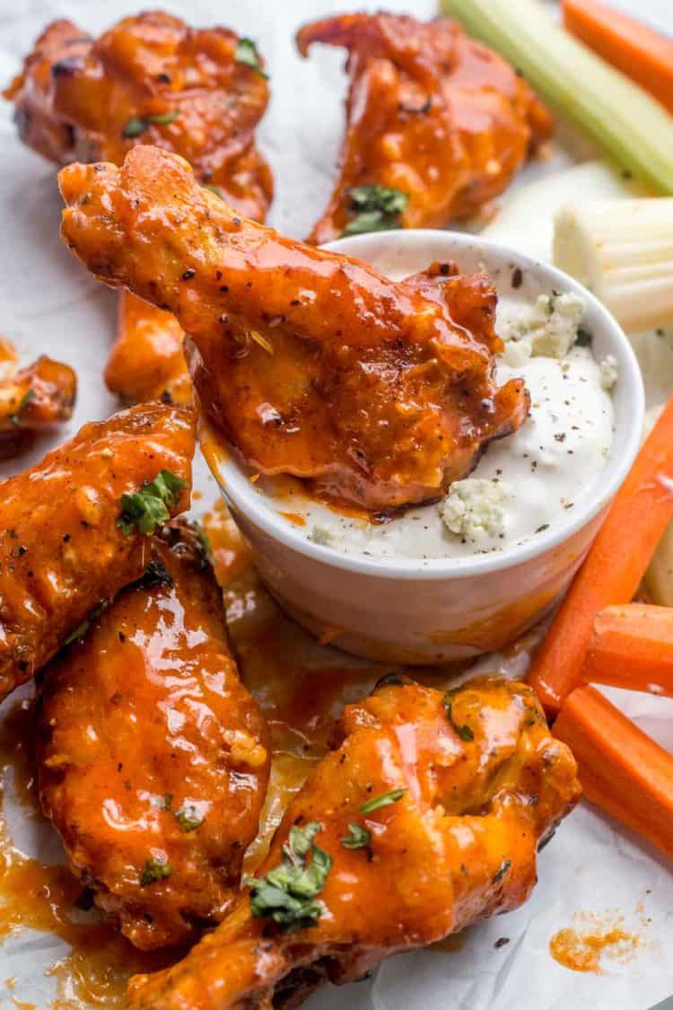 Baked chicken wings tossed in a mild buffalo sauce dipped into Ranch with celery and ranch on the side