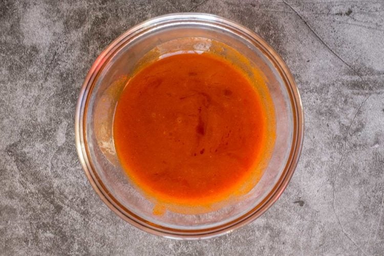 How to make homemade mild sauce with Red hot sauce, butter, garlic, and sugar.