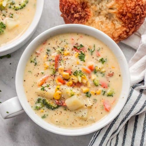 A bowl of creamy vegetable soup.