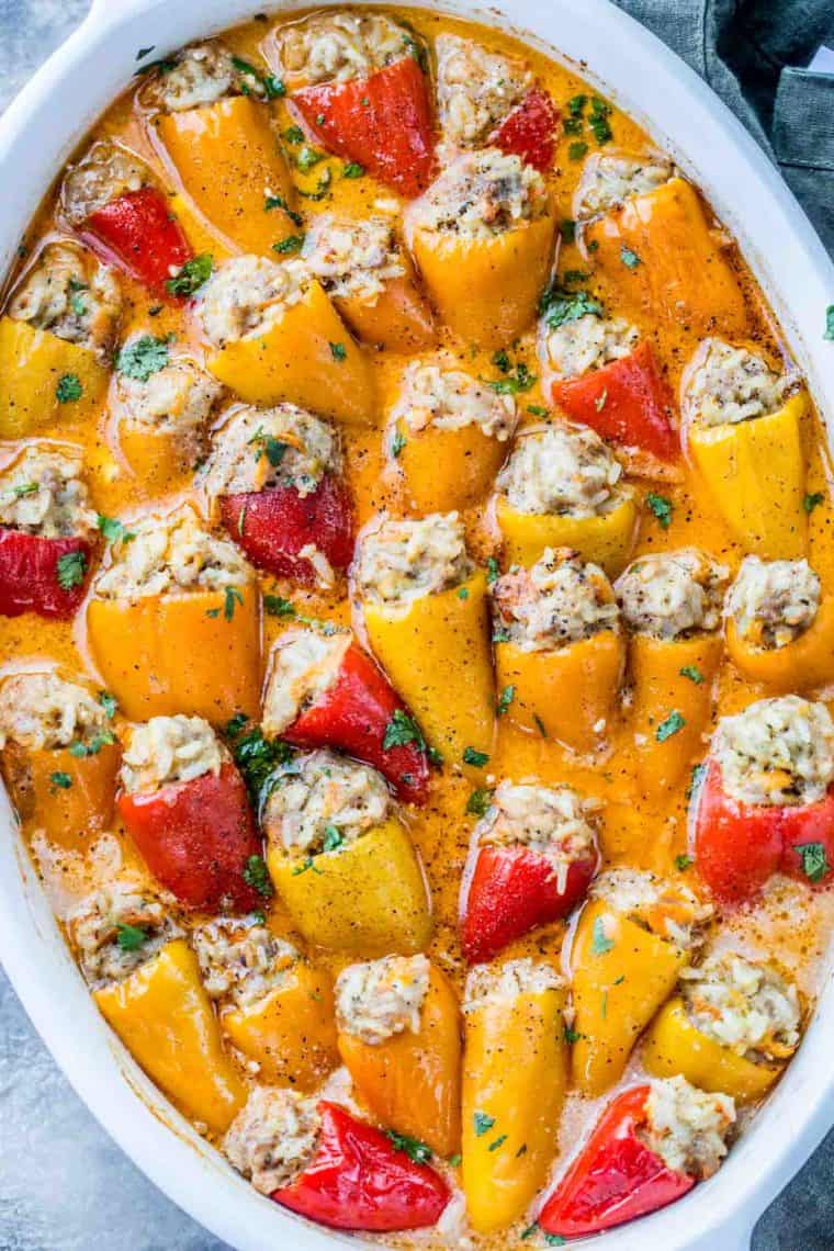 Stuffed mini peppers loaded with a hearty meat filling topped with fresh greens. 