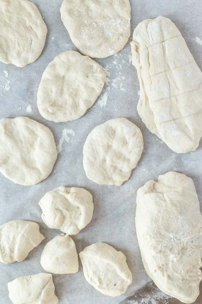 The piroshki dough balls flattened into discs. 