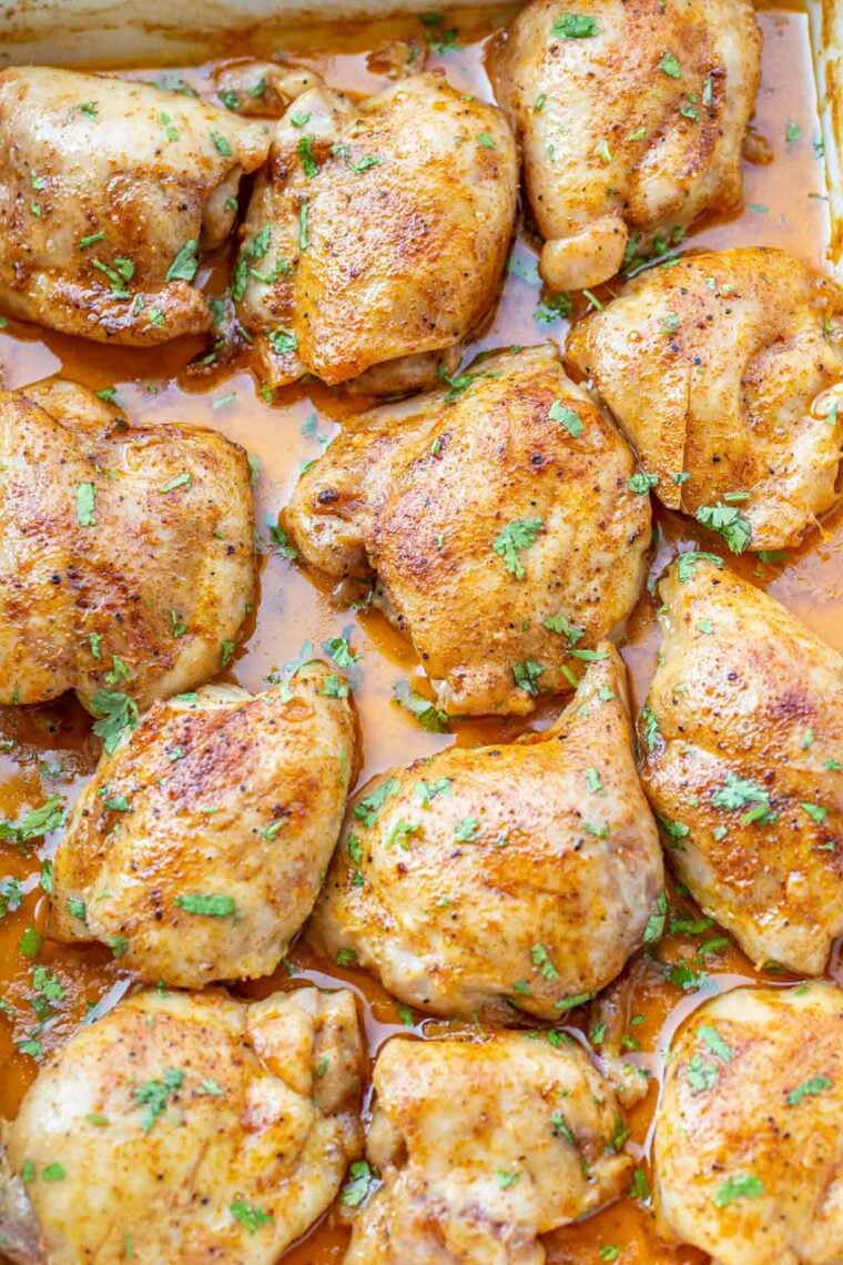 Tender baked chicken thighs in a casserole.