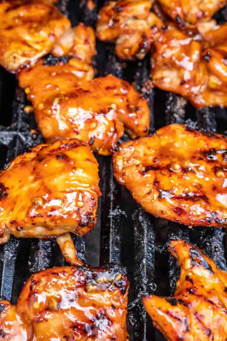 Grilled teriyaki chicken on the grill. 