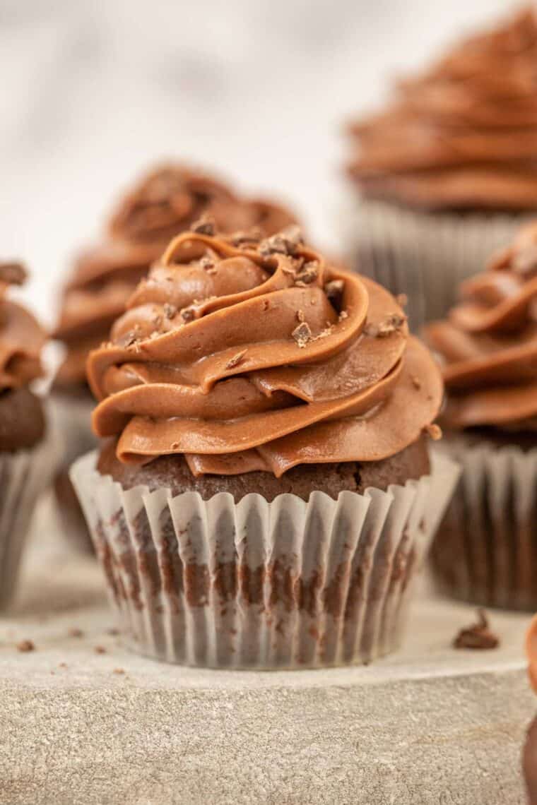 Chocolate cupcake topped with crushed chocolate. 