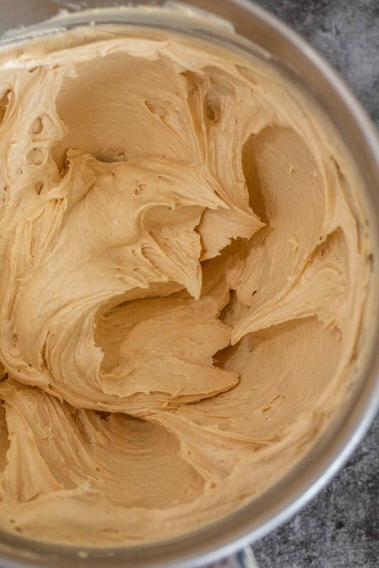 Fluffy peanut butter frosting in a bowl. 