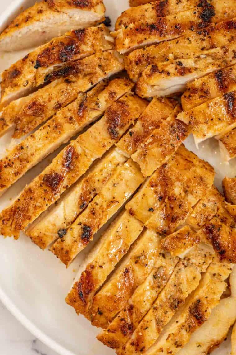 The grilled chicken breast cut into strips. 