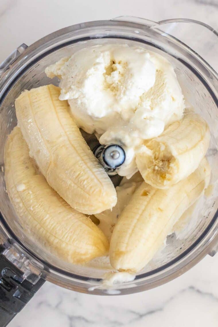 Banana and ice cream in a blender.