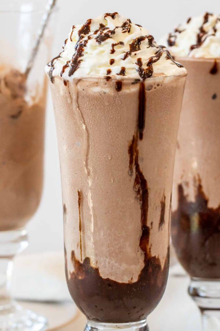 Chocolate flavored milkshakes in glasses.