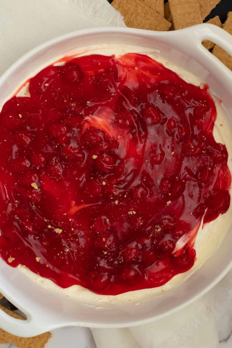Close up of finished cherry cheesecake dip.