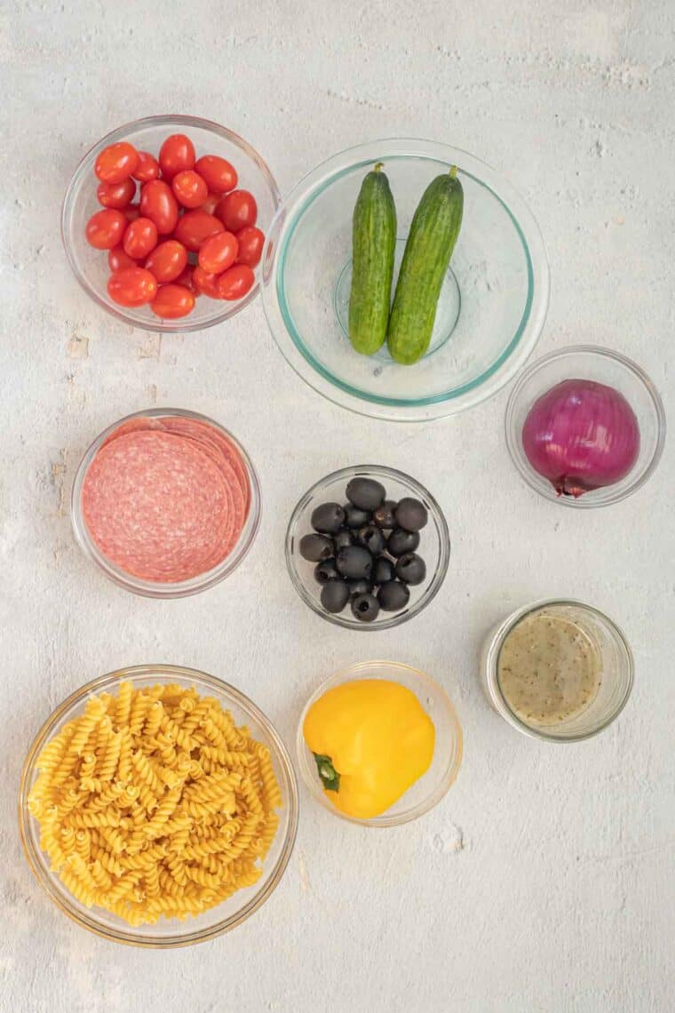 Ingredients for pasta salad in ramekins. 