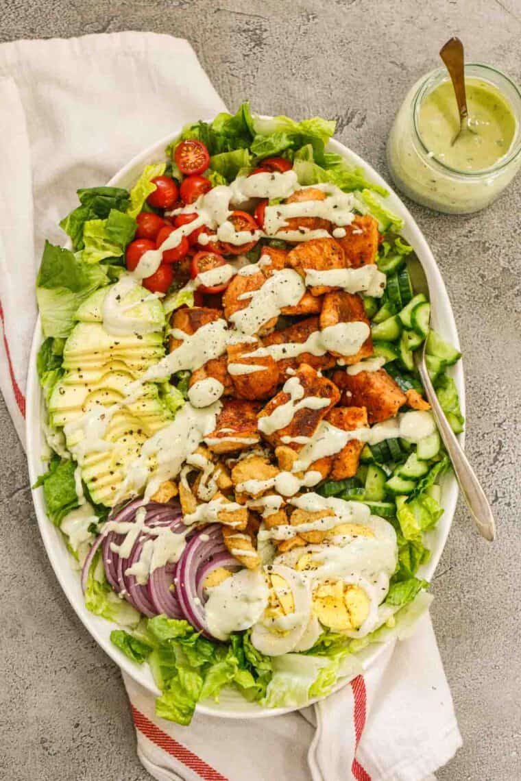 Salmon Salad drizzled with a delicious avocado dressing.