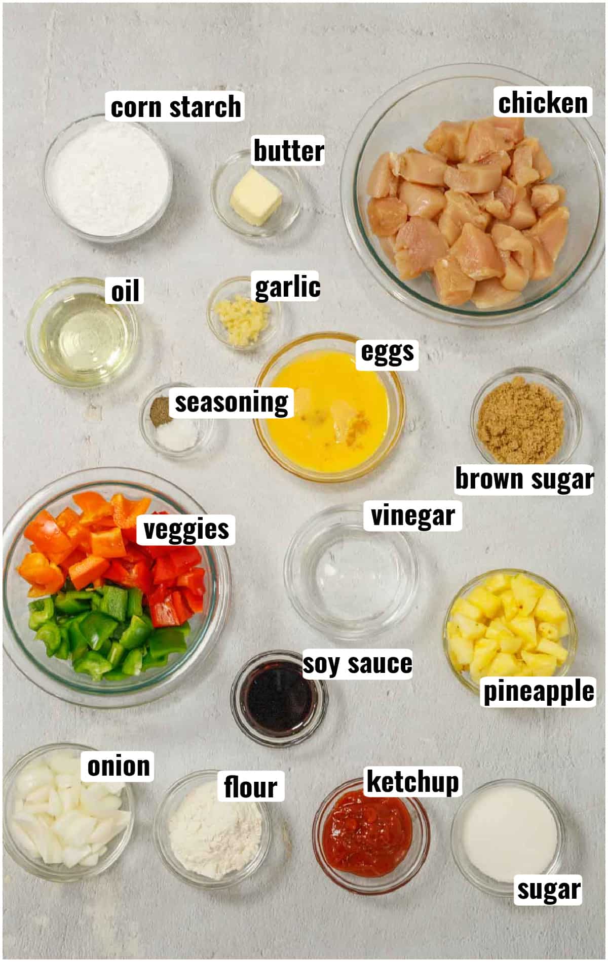 All ingredients needed to make sweet and sour chicken ready to be made.