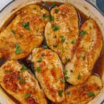 Square image of chicken in a honey sauce.