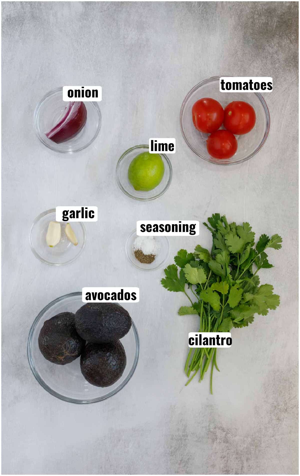All ingredients needed to make guacamole.