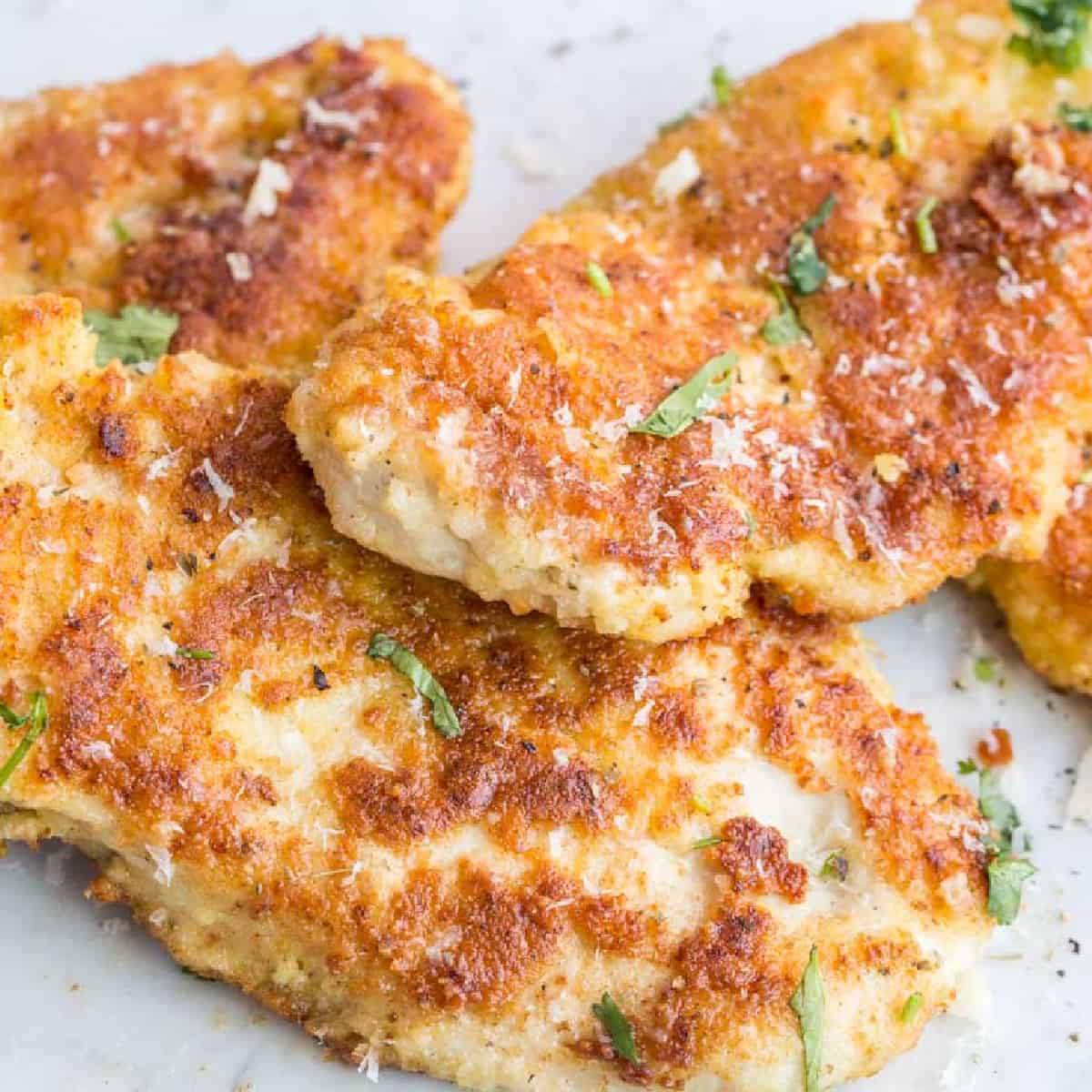 Close up of finished parmesan crusted chicken.
