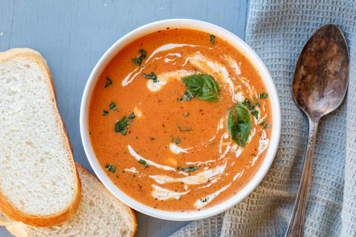 Finished tomato soup topped with basil.