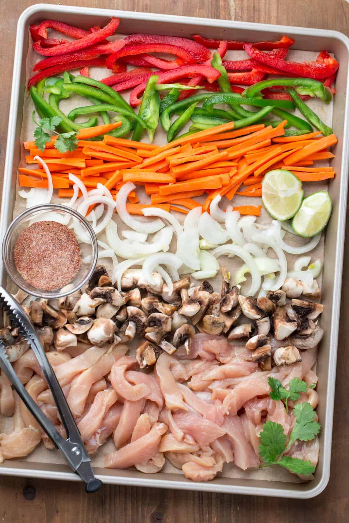 A pan of all the chicken fajita ingredients.