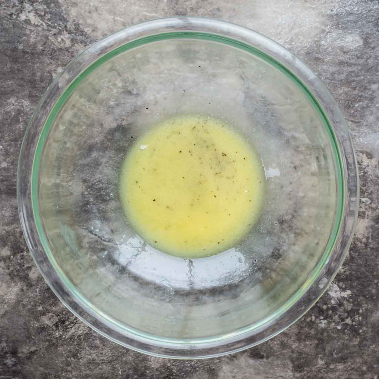 A bowl of the melted butter mixture.
