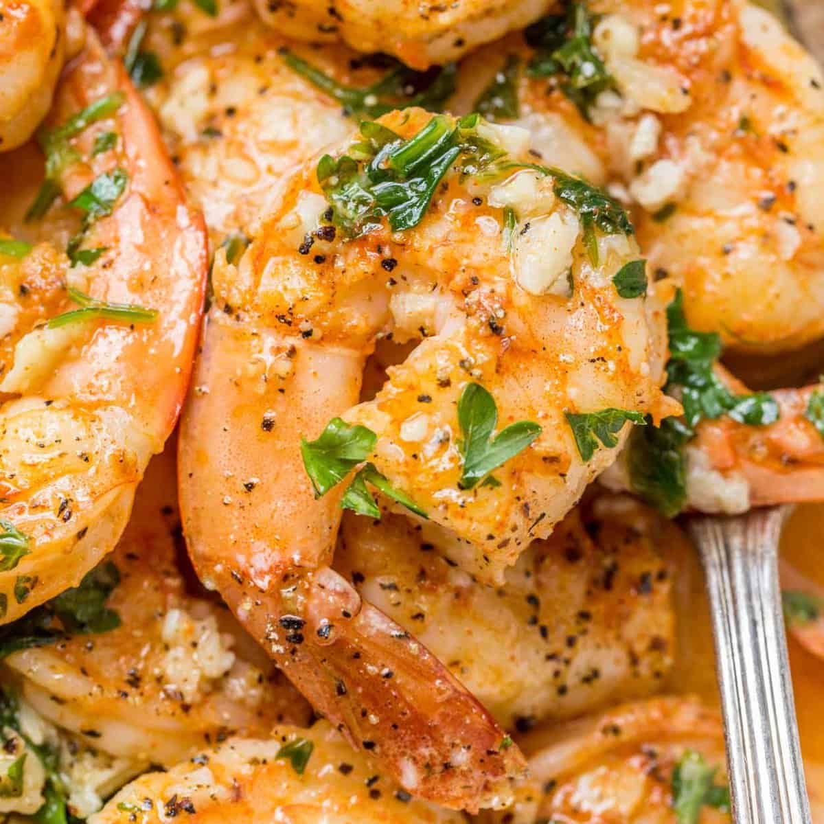 Shrimp scampi topped with fresh parsley. 