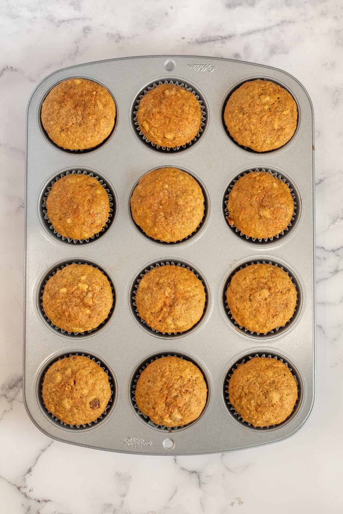 The baked cupcakes in the muffin pan.