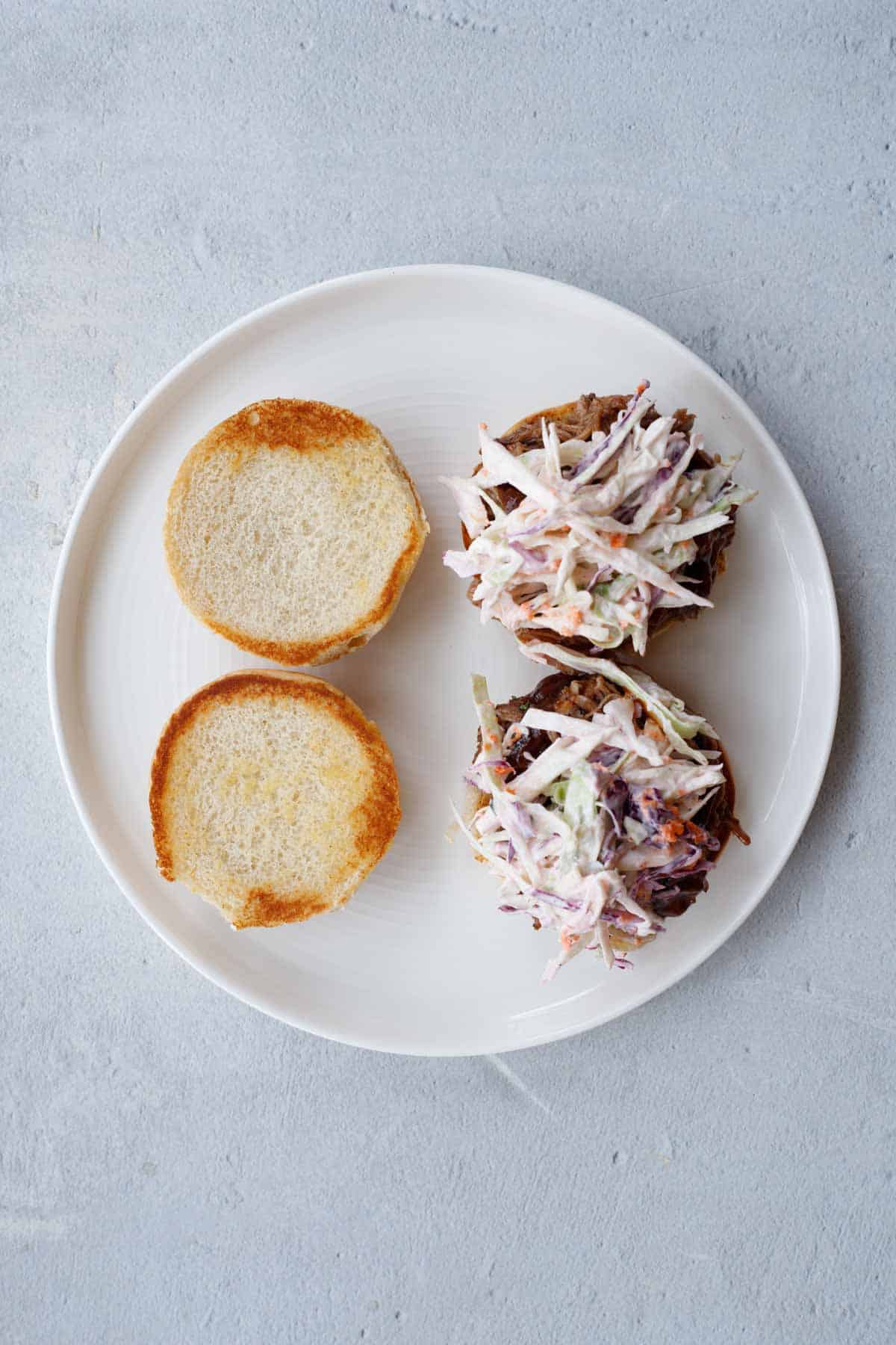 The assembled sandwiches with the coleslaw on top. 