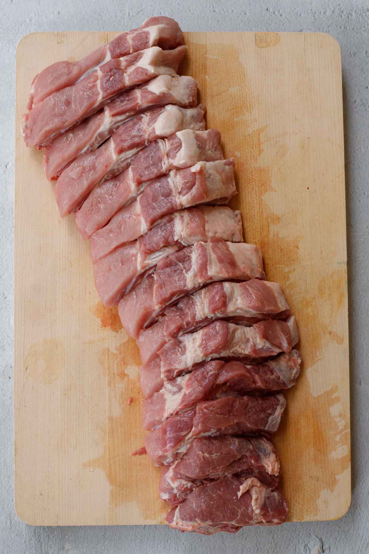 The pork ribs divided into individual ribs. 