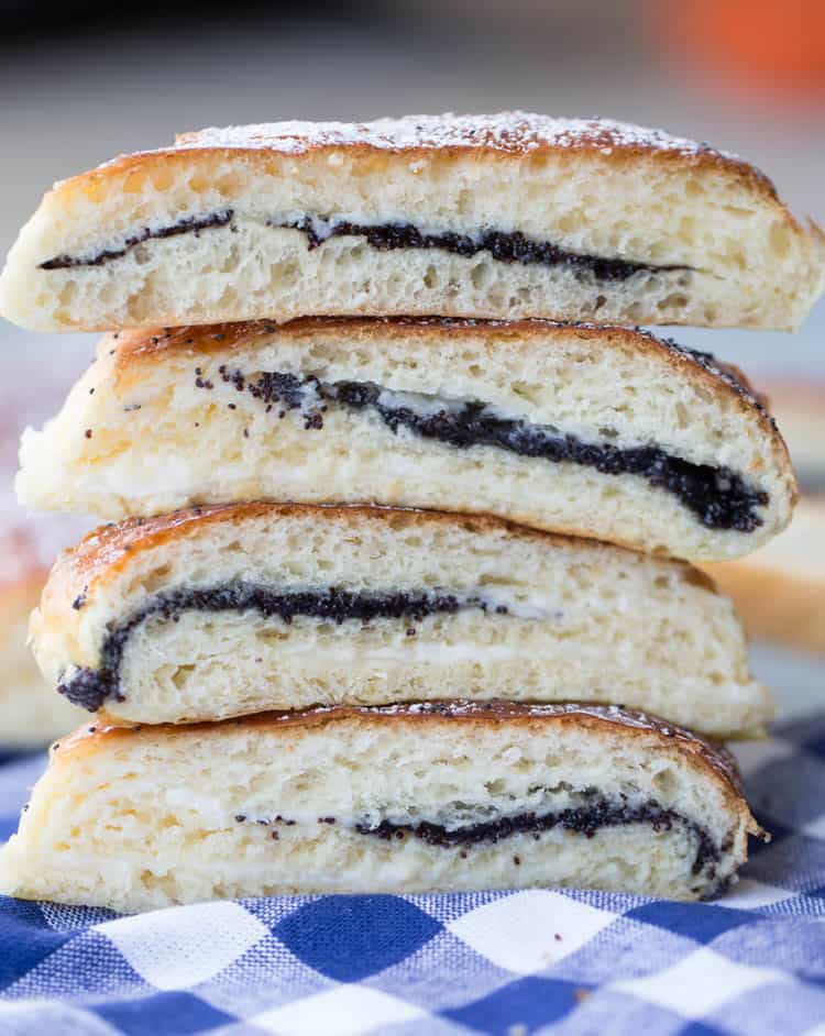 A stack of sliced poppy seed rolls. 