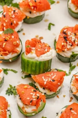 Cucumber salmon bites on a tray.