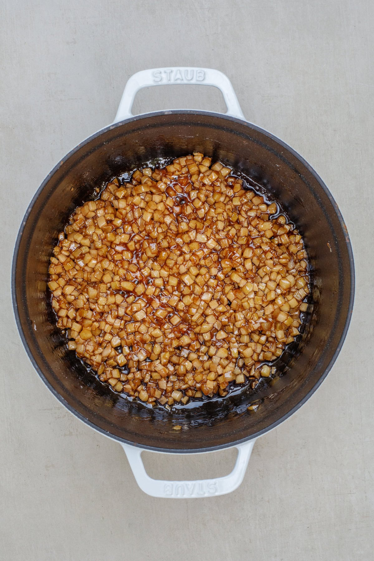 This apple turnover recipe is loaded with a tender apple filling from scratch. A saucepan with the cooking apple filling.