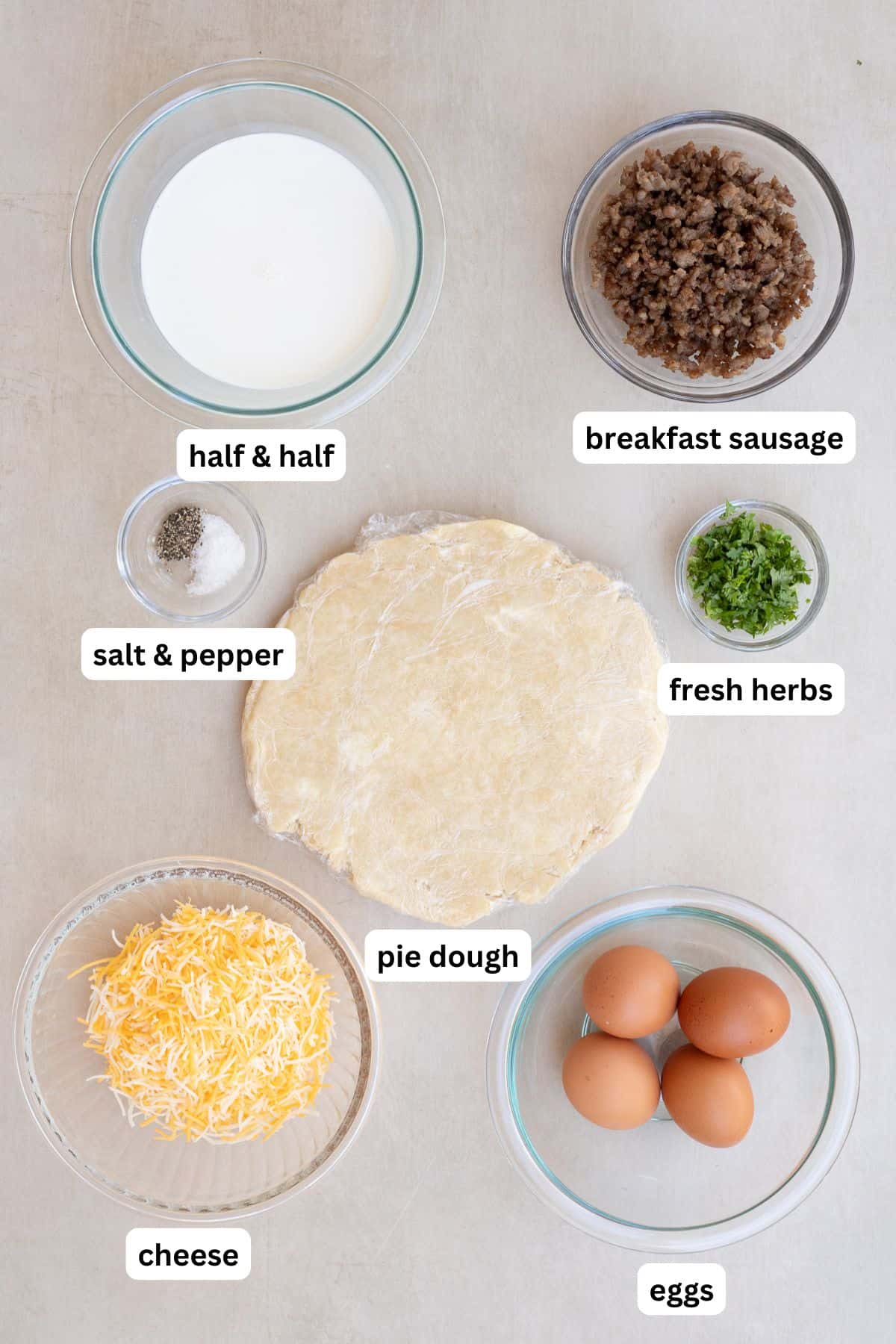 Mini Quiche Recipe with Eggs and Cheese All of the ingredients for a mini quiche.