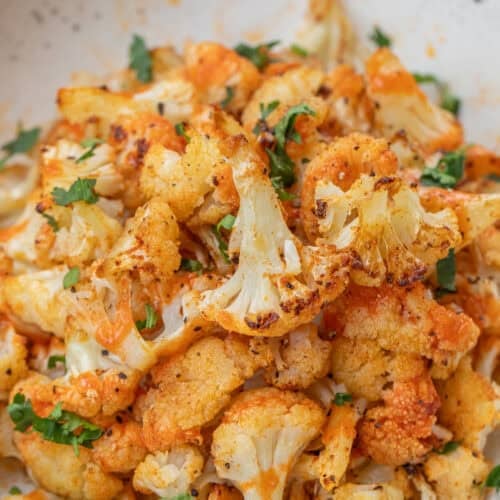 Crispy cauliflower made in the air fryer, served in a bowl.