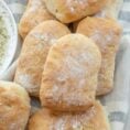 The ciabatta rolls stacked on each other.